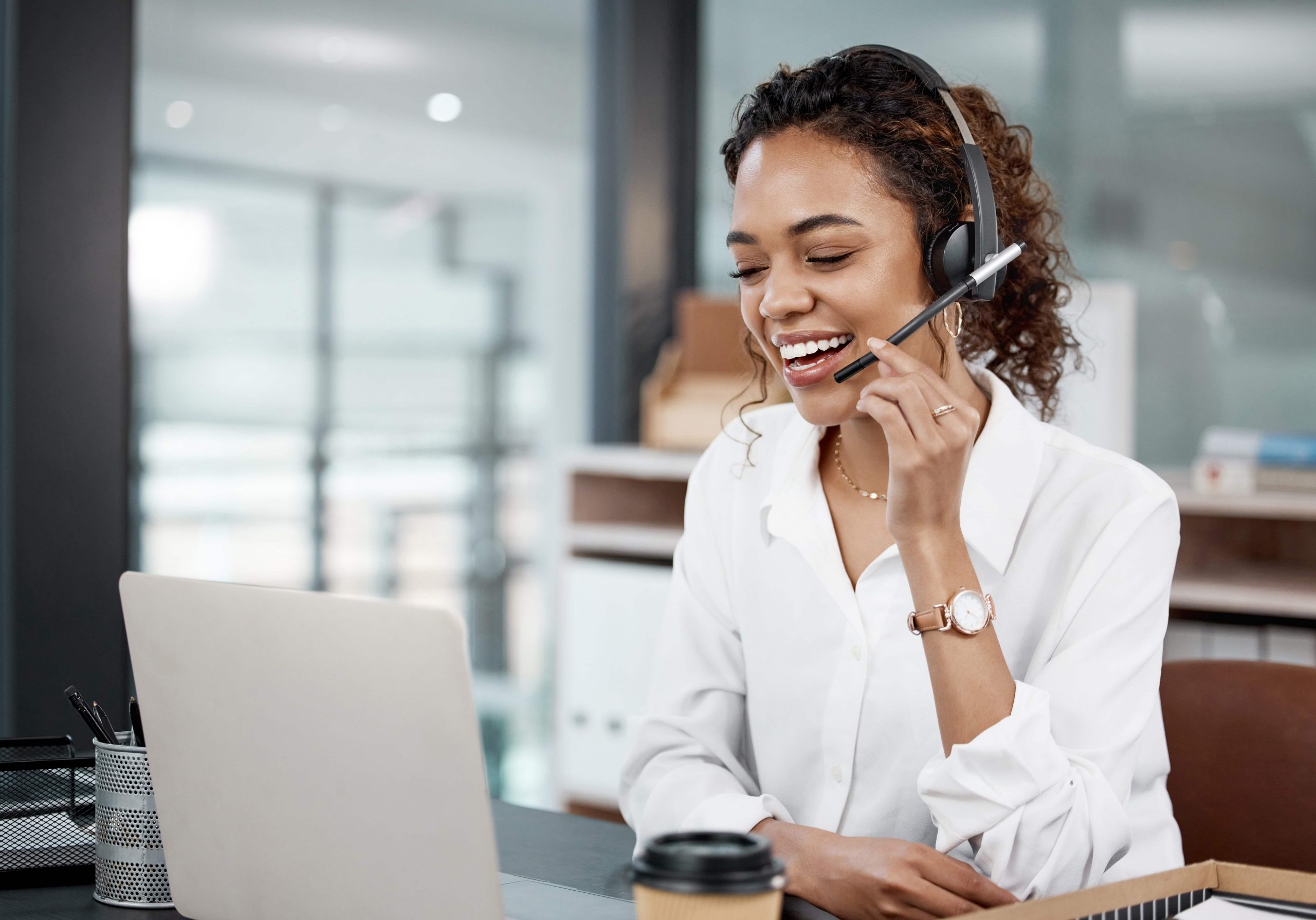 Woman on a headset at an office